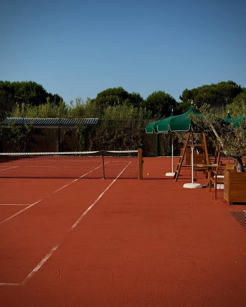 Private tennis court session at golden hour